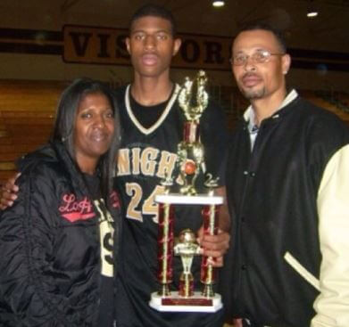 Paul George Sr. with his wife Paulette and son Paul George in 2013.